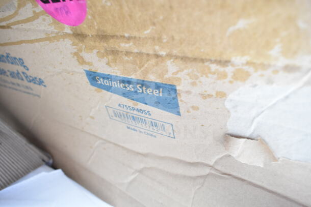 Cardboard box labeled "Stainless Steel," model 475SP40SS, Made in China. Contains scratch and dent items.