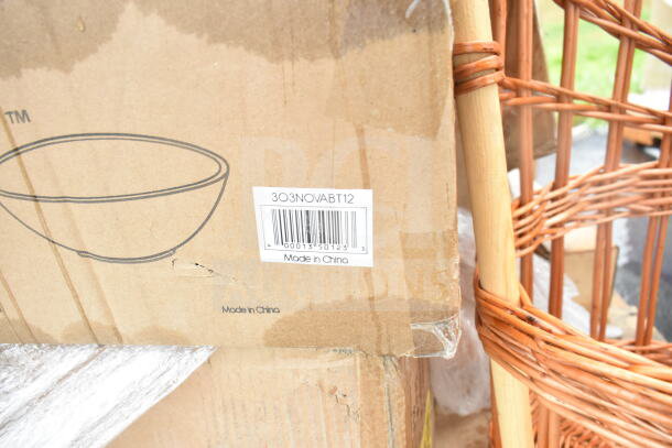 Cardboard box with barcode "303NOVABT12," marked "Made in China," part of a scratch and dent auction lot.