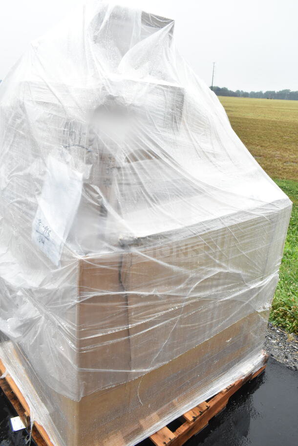 Plastic-wrapped pallet containing scratch and dent items including a food warmer, compressor, and thermostat. Marked 10x bid value.