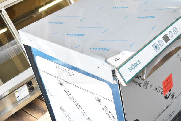 BRAND NEW SCRATCH AND DENT Noble 495LTUC24 undercounter dishwasher. Visible branding and control panel, wrapped in protective film.
