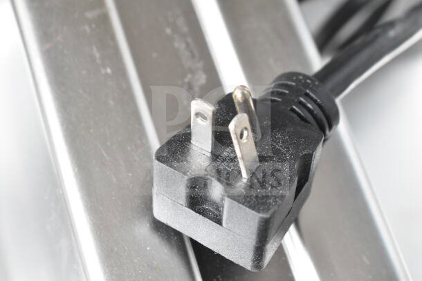 Alt text: Avantco 177FW200D full-size dual well electric food warmer plug close-up, new, with stainless steel surface.