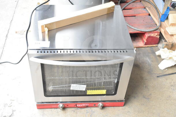Brand new Avantco 177CO28M half-size countertop convection oven, 2.3 cu. ft., 208/240V, minor scratches, front labels visible.