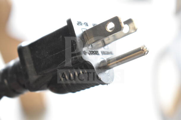 Close-up of an electric plug for Avantco 177W50CKR food warmer, showing prongs and partial label.
