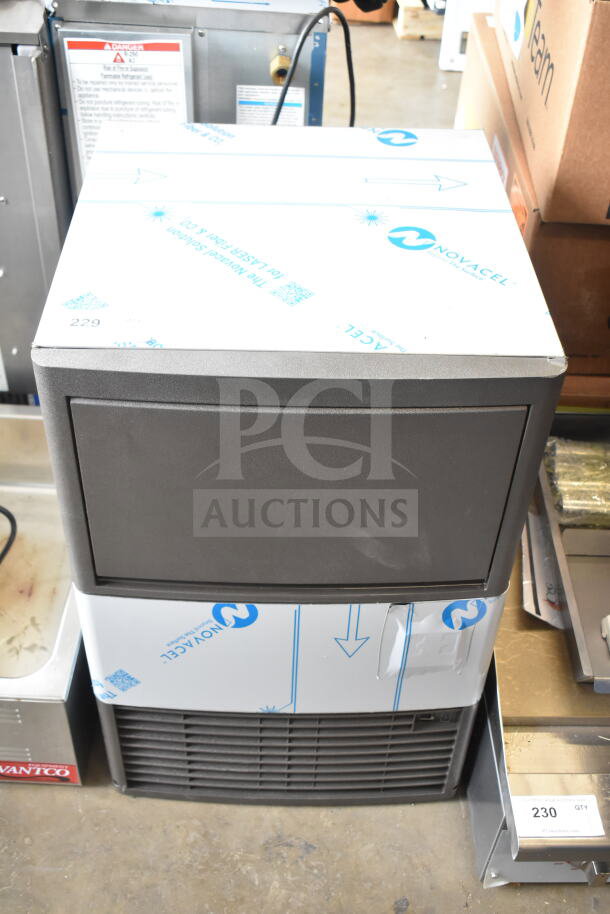 Manitowoc UDP0065A-161 NEO ice machine, 19 11/16", brand new, scratch and dent, with 31 lb. bin, 62 lb. capacity.