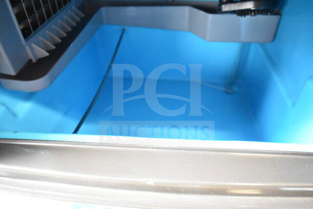 Manitowoc UDP0065A-161 undercounter ice machine interior, new condition, includes 31 lb. bin, scratch and dent sale.