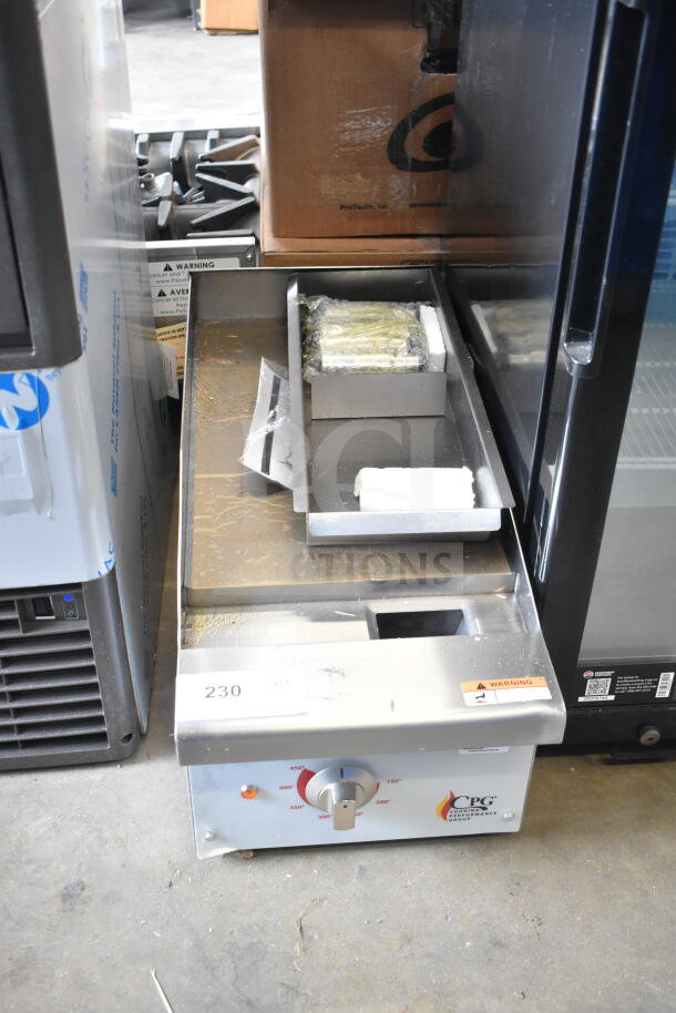 BRAND NEW WITH SCRATCH AND DENT Cooking Performance Group 12" electric griddle, Model 351GCPG12M, 208/240V, mint with minor damage.