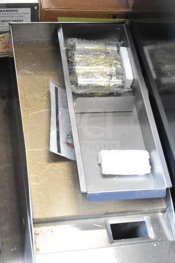BRAND NEW SCRATCH AND DENT! CPG G-CPG-12-M 12" electric griddle, 208/240 volts, countertop design, slight wear visible.