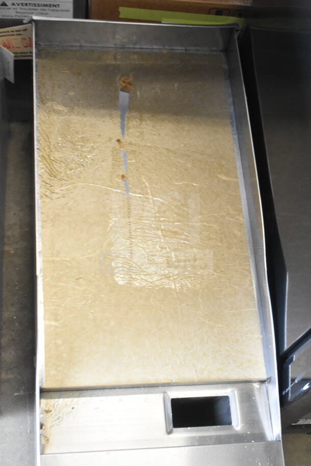 Brand new Cooking Performance Group G-CPG-12-M 12" electric griddle, scratch and dent, 208/240V, flat top surface.