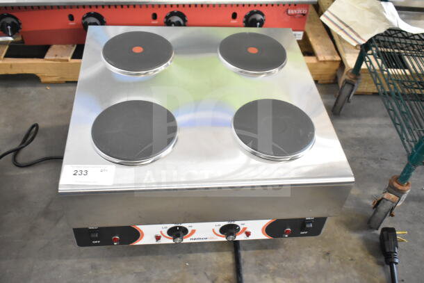 Brand new Nemco 6311-4-240 electric countertop hot plate with 4 solid burners, 240 volts, 1 phase, minor scratches.