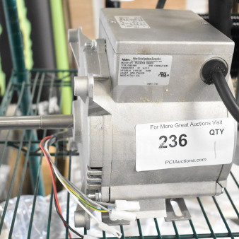 Brand new Nidec motor, 115-120V, 1 phase. Visible tags indicate slight scratches and dents. Made in Italy.