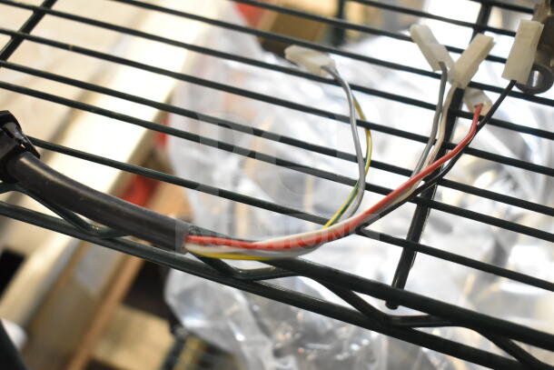 Nidec motor, brand new with minor scratches, 115-120 volts, 1 phase, wires visible.