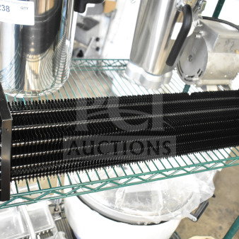 Brand new Monix evaporator coil 17818817, scratch and dent condition, black metal fins, visible copper tubing.