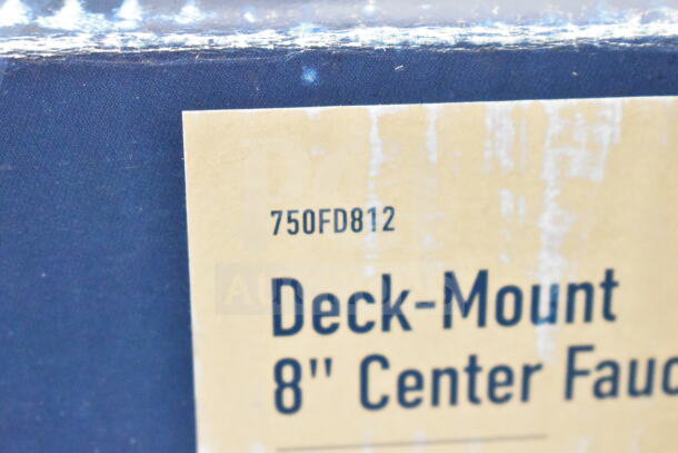 Brand new Monix Waterloo faucet model 750FD812, desk-mounted with 8" centers, 12" swing spout; box has scratches and dents.