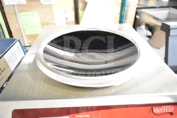 Brand new Avantco 177IWC35 countertop wok induction range, 208-240 Volts, minor scratches and dents, visible Avantco logo.