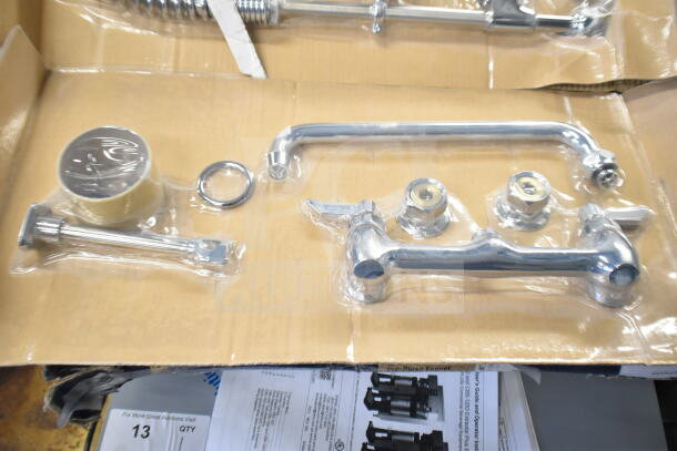 BRAND NEW SCRATCH AND DENT Waterloo faucet with spray nozzle, chrome finish, in original packaging, slight cosmetic imperfections.