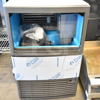 Manitowoc UDP0080A-161 NEO undercounter dice cube ice machine, 31 lb. bin, 110 lb. capacity, air-cooled, new condition.