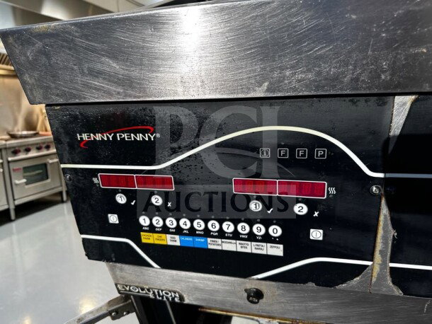 Henny Penny EEG242.0_NAT Evolution Elite® 2-Well Gas Fryer control panel, showcasing digital display and control buttons.