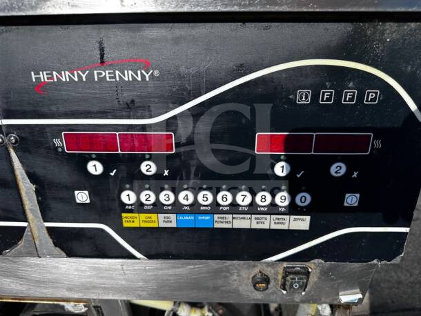 Henny Penny EEG242.0_NAT Evolution Elite 2-Well Gas Fryer control panel, showing numeric keypad and cooking presets.