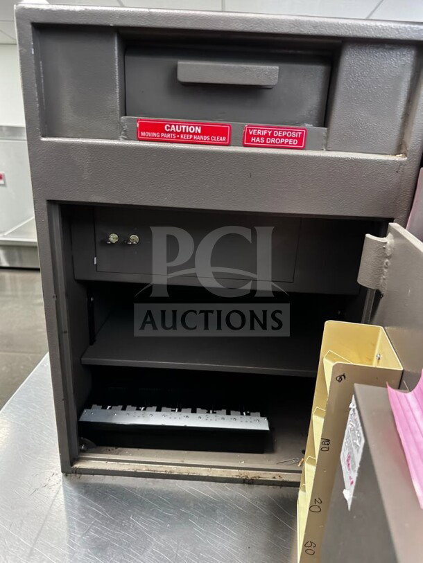 CalSafe Commercial Depository Safe, high-grade condition, digital keypad lock, gray, open with interior view, caution labels visible.