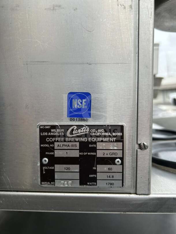 Wilbur Curtis ALPHA-III-S commercial coffee brewer label, showing model, voltage 120V, NSF & UL listed, tested.