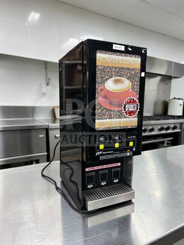 Wilbur Curtis PC-3D-10-01 cappuccino machine, 3 hoppers, excellent condition, fully operational, 120V, countertop display.