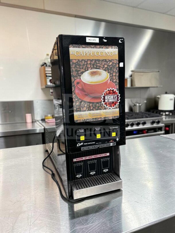 Wilbur Curtis PC-3D-10-01 cappuccino machine, 3 hoppers, excellent condition, 120V, fully tested, front panel showing beverage options.
