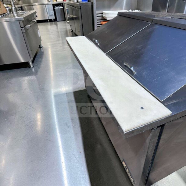 True TSSU-60-24M-B-ST-HC refrigerated sandwich prep table, 60-in, stainless steel, two doors, excellent condition.