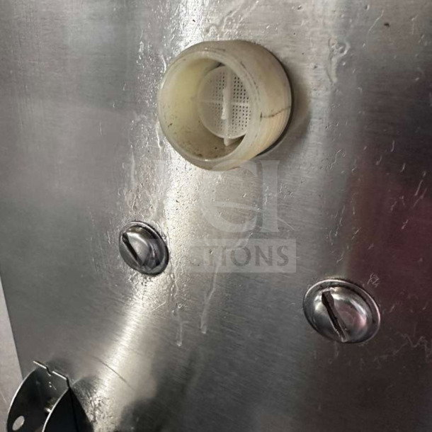 Wilbur Curtis G4TB tea brewer in immaculate condition, 3–5 gallon capacity, 120V, digital control, metal surface detail shown.