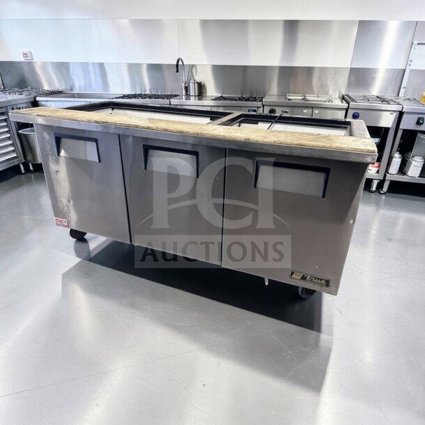 True TSSU-72-30M-B-ST-HC 72" refrigerated prep table, stainless steel, elite condition, fully tested, operational.