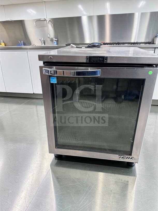 True TUC-27G-HC commercial undercounter refrigerator, stainless steel, glass door, 27 inches, excellent condition, 115V.