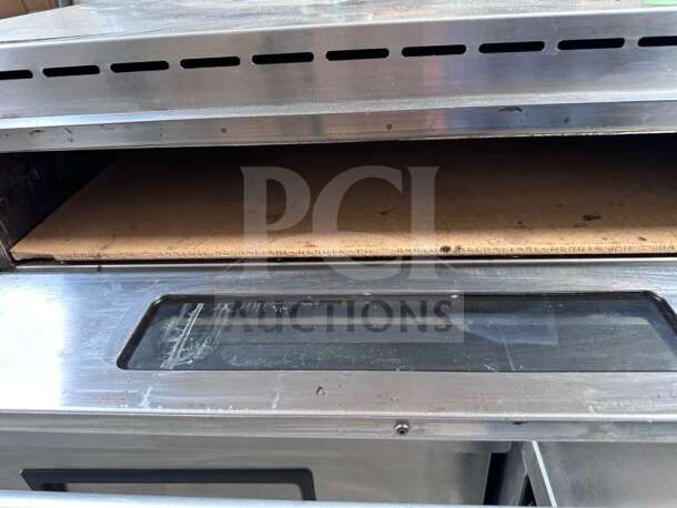 Equipex PZ-4302D countertop pizza deck oven, stainless steel, superior condition, 208–240V, fully operational.