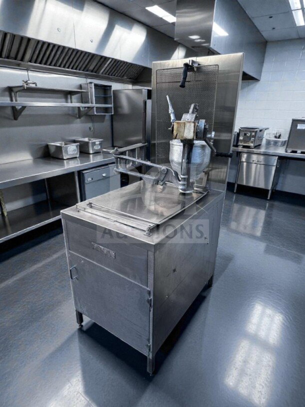 Stainless steel Lucks G1826 commercial donut fryer with donut screen and manual depositor, excellent condition, 60,000 BTU.