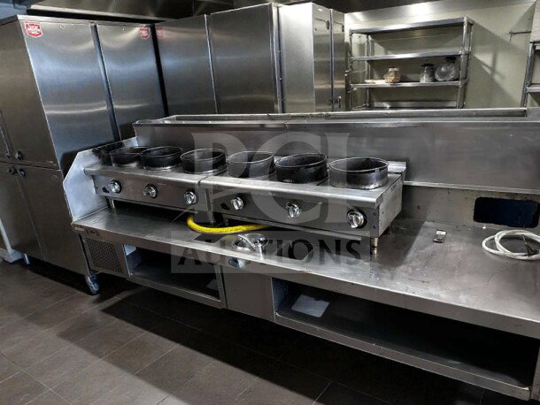 Stainless steel commercial 6 burner wok system with refrigerated top, in immaculate condition, gas-operated, fully tested.