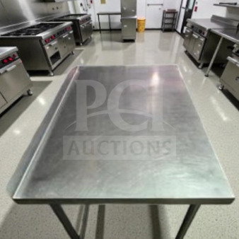 Stainless steel 46" x 30" mobile work table with wheels, unbranded, well-maintained, fully inspected, ready for use.