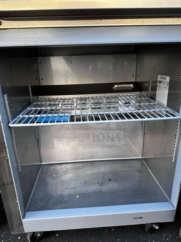 Hoshizaki CRMF27 undercounter freezer, stainless steel, 7.2 cu. ft., immaculate condition, NSF/ETL listed, interior view.