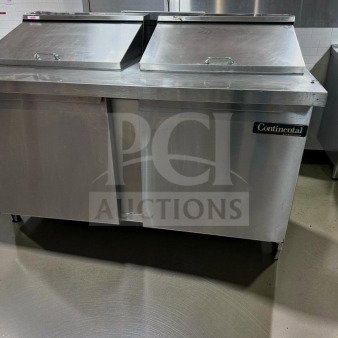 Stainless steel kitchen equipment with Continental Refrigeration logo, shown in commercial setting. Silver metallic finish.