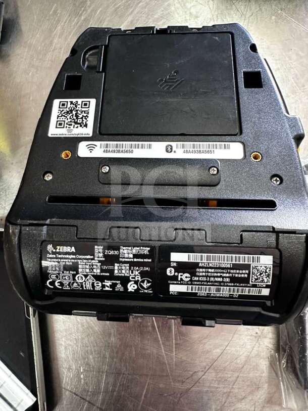 Zebra ZQ630 mobile thermal label printer, elite condition, labels and QR codes visible, fully tested and operational.