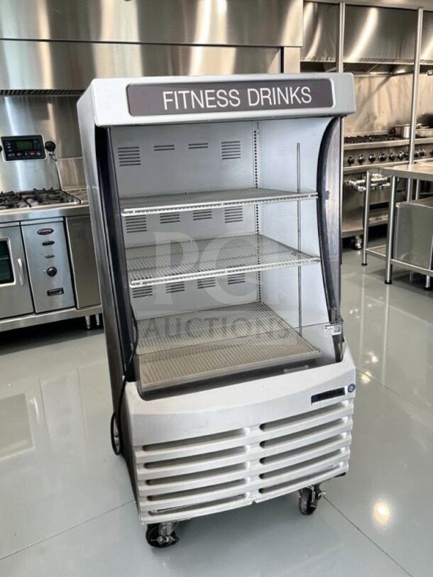 Beverage-Air BZ13-1-W open display case, 30" wide, 3-tier, exceptional condition, "Fitness Drinks" label, on wheels.