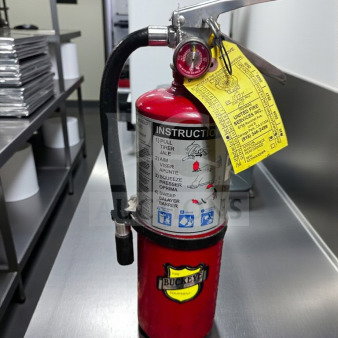 Buckeye 5 HI SA40 ABC fire extinguisher, prime condition, inspected, operational, UL listed, with instruction labels.