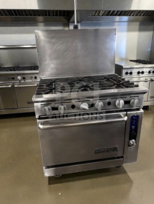 Alt text: "Imperial IR-6-C 36-inch 6 burner gas range with convection oven, in exceptional condition, natural gas, fully tested."