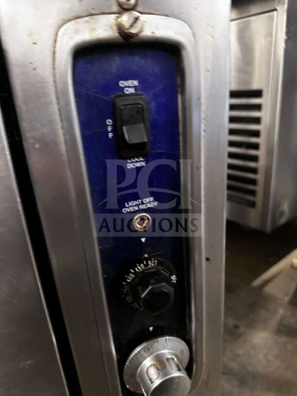 Imperial IR-6-C control panel with oven on/off switch and temperature dial. Markings indicate oven readiness.