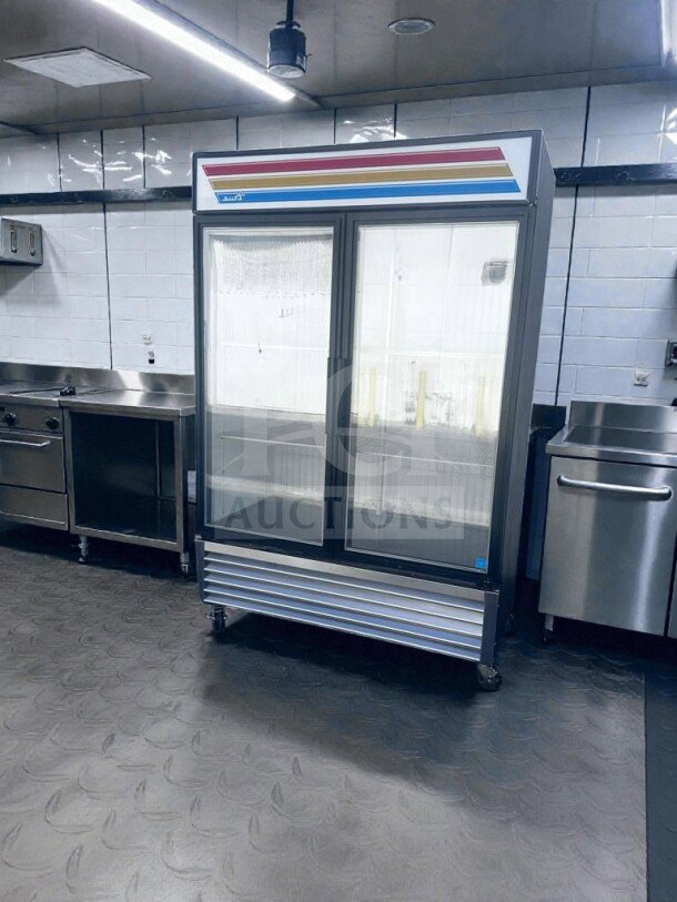 True GDM-49F-LTF-HC~TSL01 freezer merchandiser, 54", black glass doors, LED lighting, 8 shelves, NSF/UL listed, superior condition.