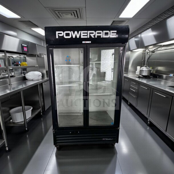 Powerade branded True GDM-43EM glass door merchandiser refrigerator, excellent condition, 2 swing glass doors, ENERGY STAR certified.