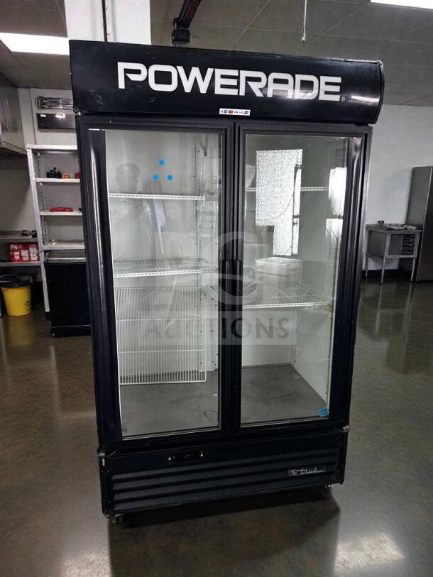 True GDM-43EM Powerade branded glass door merchandiser refrigerator; excellent condition; 2 swing doors; ENERGY STAR rated.