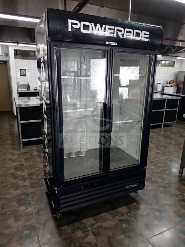 True GDM-43EM glass door merchandiser refrigerator, Powerade branded, excellent condition, ENERGY STAR, NSF listed.