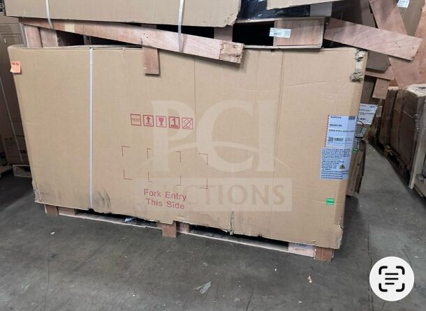 Brand new KoolMore RD32C-SS refrigerated deli display case in original packaging on a pallet. Model info visible.