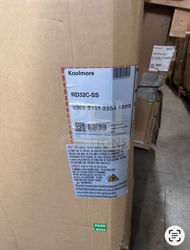 KoolMore RD32C-SS refrigerated deli display case in packaging. Model RD32C-SS label visible, indicating ETL sanitation listing.
