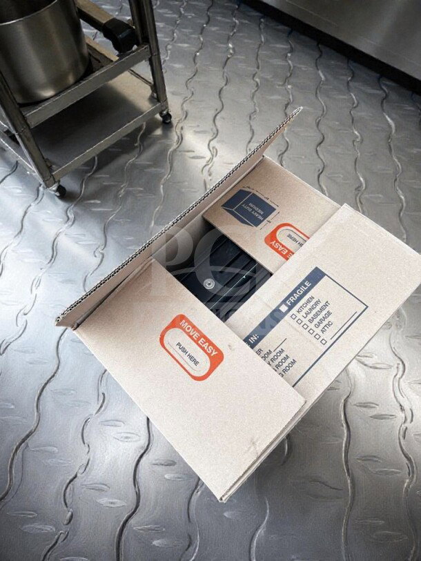 Box of restaurant POS system equipment, brand new condition, generic make, labeled "Move Easy" and "Fragile," ready for setup.