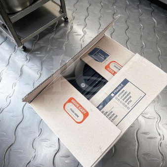 Box of restaurant POS system equipment, brand new condition, generic make, labeled "Move Easy" and "Fragile," ready for setup.