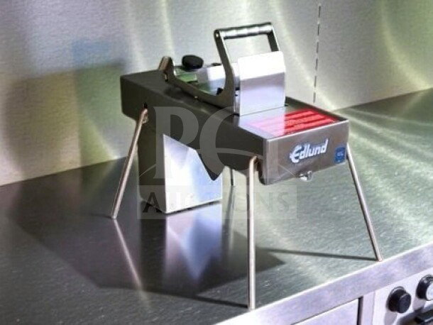 Edlund Series 350 electric tomato slicer, stainless steel and aluminum, 115V, fully tested, NSF listed, excellent condition.